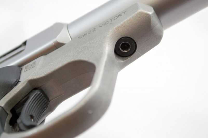 We Shoot the New Smith & Wesson Victory .22 LR Pistol The take-down screw is inset and stays out of the way of your firing hand.