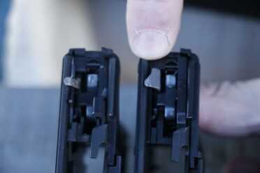 Notice the differences in the firing mechanisms between models this is not just a re-skinning that the internals have been completely redesigned.