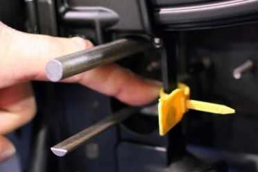 An adjustable post rides behind the trigger and won't allow it to move.