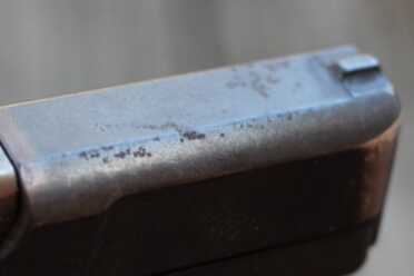 Some slight rust on the top of the slide. 