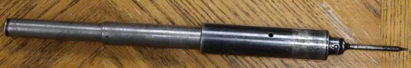 Tube used to in blowback operated bolt/recoil system holding firing pin.