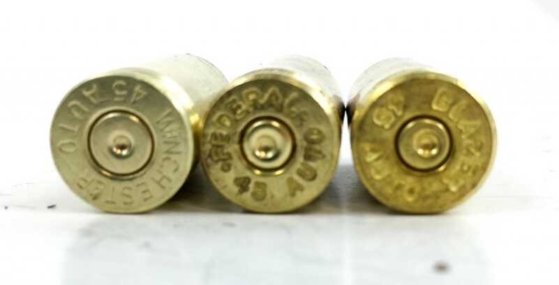 Keep an eye out for brass with the "wrong" primer sizes like these two on the right. Even though they are .45 ACP cases, they have small pistol primer pockets. You can reload them, you just don't want to mix them in the same batch as regulars when adding new primers.
