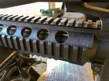 This one had a quad rail setup although the newest catalog shows an M-Lock rail.