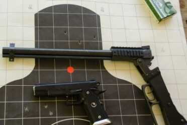 The rifle was fired from a rest handgun two-handed grip standing. 