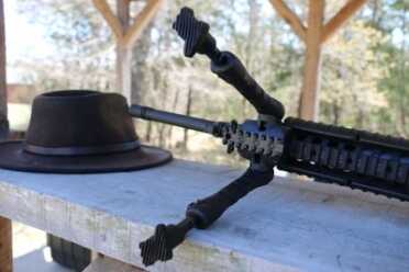 As Close to an M16 as You Can Get: FN's Military Collector Series The CAA bipod attached to the lower forearm rail through the innovative design you did not give up any rail space