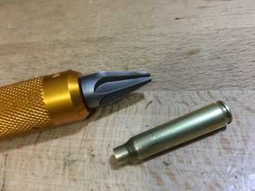 This Lyman hand tool chamfers and deburrs with a different tool head on each end. 