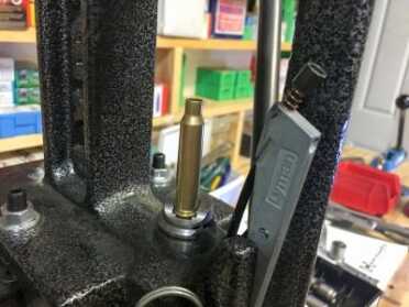 Reloading: Priming For Success The spring-loaded priming arm swings out of the way for other operations.