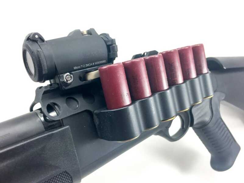 Through some experimentation, I've found that shells work best in the base down configuration. The optic effectively prevents "over the top" loading, but support hand "underneath" loading works like a champ.