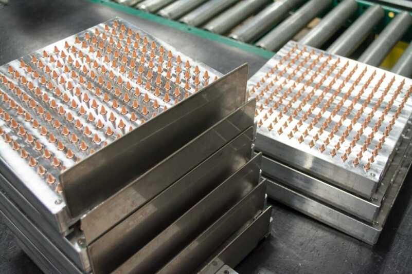 Sig loads the 300 Blackout using trays of 210 at once to get better batch consistency.