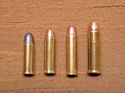 Shown for comparison (from left to right) is a .32 Long, a .32 H&R Mag., a .327 Fed. Mag. and a .357 Mag.