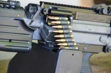 The M249S can feed from a disintegrating belt system that hold the 5.56 NATO rounds.