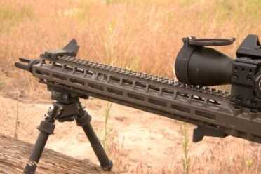 Designed to match the barrel, the AXTS custom hand guard extends all the way to the base of the flash hider, completely protecting the barrel. 