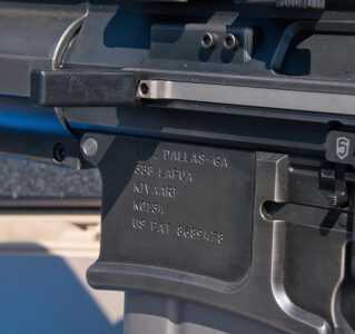 DRD Tactical Takedown Kivaari Semi-Auto .338 Lapua Magnum The magazine well of the Kivaari is flared and funneled for quickly feeding in magazines. Note the charging handle.