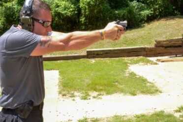 The author had several range mates try out the Bond Arms Backup as well. Note the strong two-hand stance he is using. 