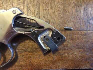 Replacing Your Revolver Grips with Hogue Exotic Hardwood! The stirrup is made from spring steel, so all you have to do is bend the arms out a little to place the pin in.