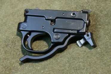 Customized Rimfire For Fighting Dangerous Domestic Terrorists! To ensure quick reloads for when facing down a hoard of squirrels, the author fitted the rifle with a Tactical Solutions Performance Extended Magazine Release.