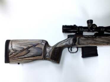 New MVP Takes .308 PMAGs/M1A Mags - Inexpensive Long Range Tack Driver! The laminated stock uses a stippling pattern for grip, has a vertical pistol grip, and a comfortable recoil pad.