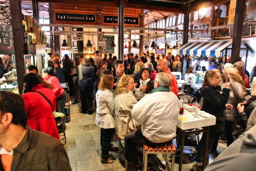 Madrid, Spain - October 21, 2012: People eat at Mercado San Miguel on October 21, 2012 in Madrid. According to Tripadvisor, it is the 2nd top shopping destination in Madrid.