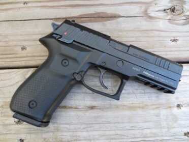 The frame-mounted, ambidextrous manual safety is one of the more distinctive features on the pistol.