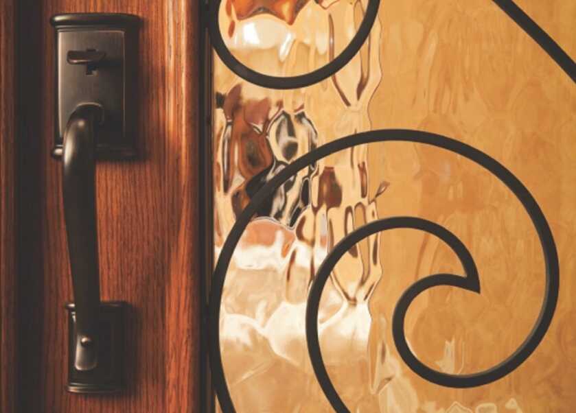 Custom home door with brass handle.