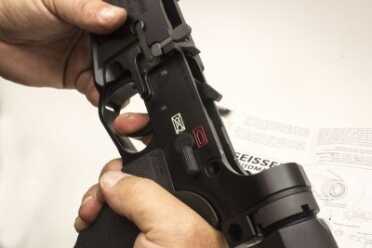 STEP 8: Check safety operation: With the hammer cocked and the safety selector set to the SAFE position, pull the trigger hard. The hammer should not fall.