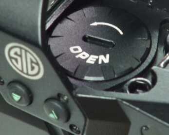 The sealed battery compartment is easy to access with the optic mounted. 