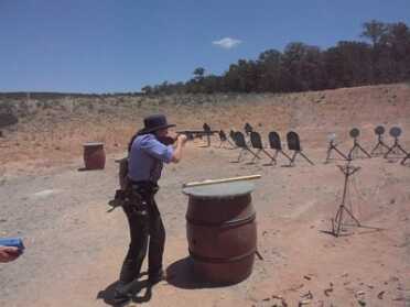 Journey Into Competitive Shooting: Ep. 7 Cowboy Action Randi Rogers, AKA Holy Terror, shooting her Cimarron Firearms 1873 rifle at End of Trail SASS World Championship. Photo Credit: Wicked Felina AKA Karen Pearcey