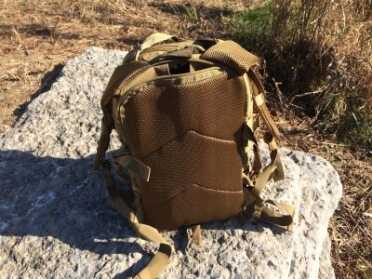 An Awesome Budget Pack — Exos-Gear Bravo Series Tactical Backpack You can see the whole at the top that allows the hose to the water bladder to pass through.
