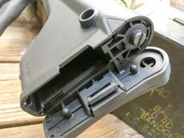 If you need to stash emergency gear like bacon jerky, there's a hollow area in the stock. 