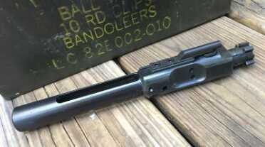 Also somewhat larger is the bolt, shown here next to a large ammo can for scale. 