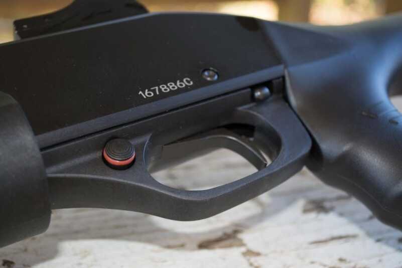 4 MSRP Stevens 320 20-Gauge Pump Home Defense Gun - Full Review The crossbolt safety is just forward of the trigger while the slide release catch is behind on the left side.