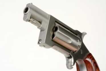 The Sidewinder sports a short, stubby one-inch barrel and stainless steel construction.