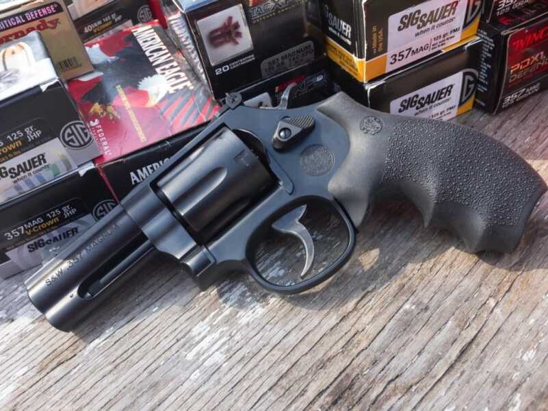 I tested the 586 L-Comp with a wide variety of .357 Magnum ammo using both wood and Hogue grips. The Hogue grips made a noticeable difference in recoil reduction. 