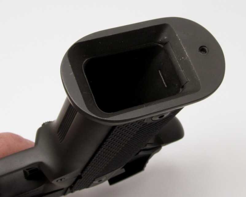 Fire-Breathing, Multi-Cal 1911: Rock Island Armory’s .22 TCM/9mm Combo – Full Review.