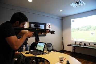 Virtual Live-Fire Hunting at Aimpoint's 'Shooting Cinema' = Next Level Fun! Virtual Live-Fire Hunting at Aimpoint's 'Shooting Cinema' = Next Level Fun!