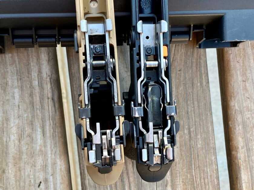 The Stacker installed next to a pistol without it installed 