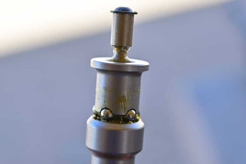 The bearing that delay the bolt on the new Maxim Defense buffer.