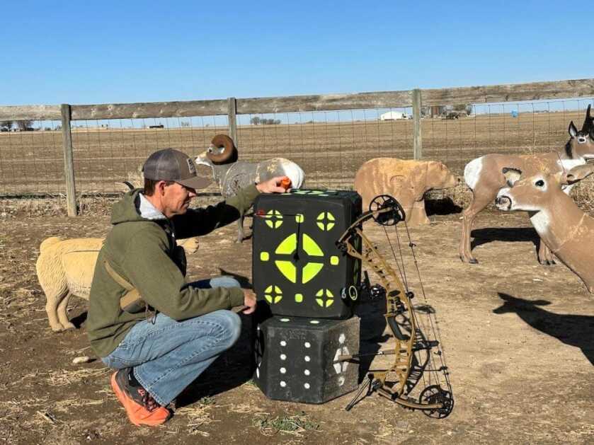 Hunter with bow and targets