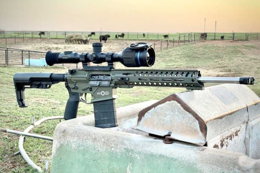 POF Rogue AR10 with Pulsar Thermion mounted on top overlooking some cattle out in the pasture