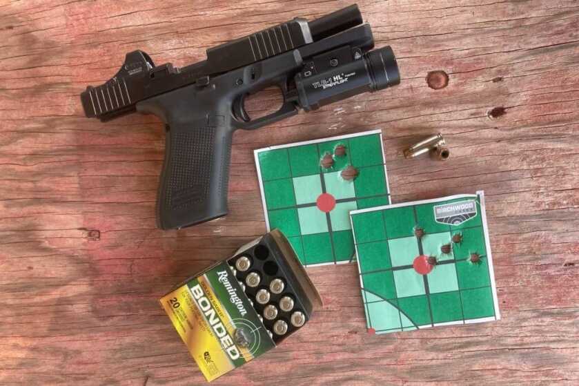 G20 Gen5 pistol with Remington ammunition and small accuracy targets against hard wood