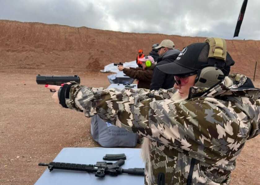 Shooting a pistol at the range