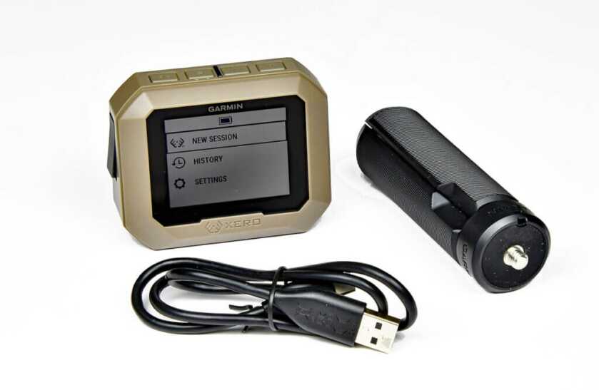 3 - Garmin Xero C1 Pro: The New King of Chronographs Garmin Xero C1 Pro chronograph with supplied bench-top tripod and charging cable