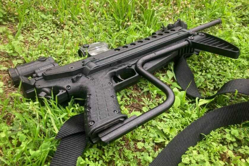 Gun on wet grass