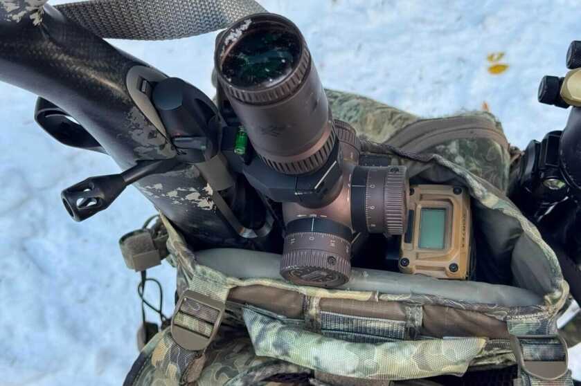 3 - Eberlestock Team Elk V2: Backcountry Hunting Pack Review! Rifle scabbard fits a rifle even when equipped with a large scope and ballistic range finder