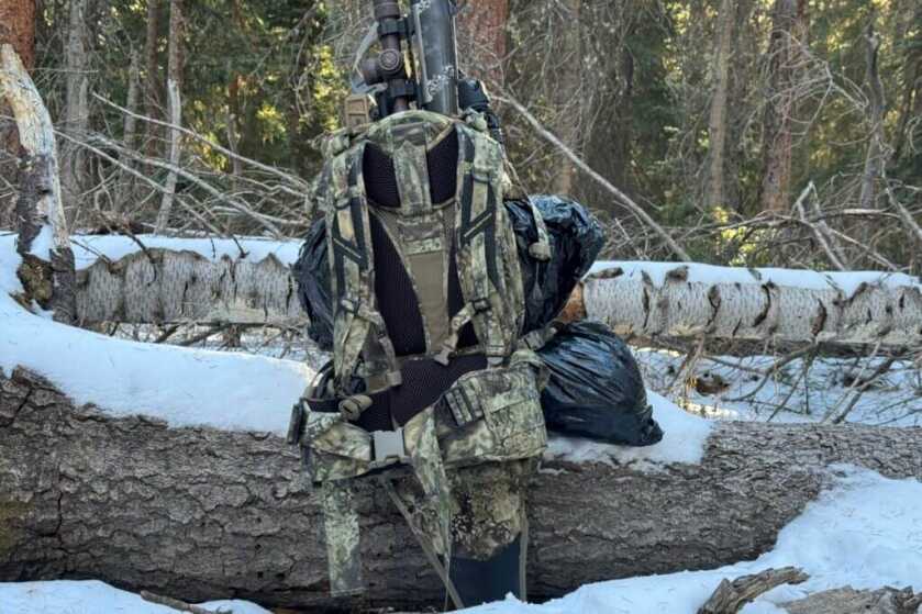 3 - Eberlestock Team Elk V2: Backcountry Hunting Pack Review! Rifle scabbard sticks out down below the hip belt, but does not bother me when hiking