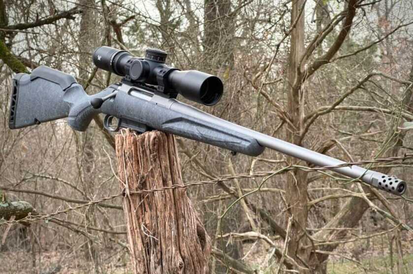 Ruger American Gen II Rifle resting on fence post in forest