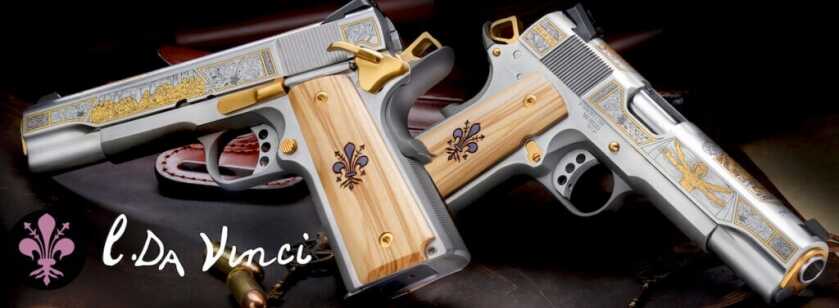 Two ornate 1911 pistols.