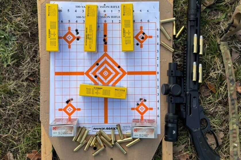 Marlin Model 1895 next to target and boxes of ammo