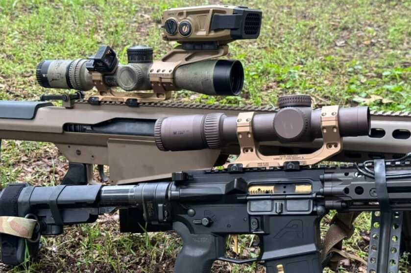 AUS Mount on rifle in grass