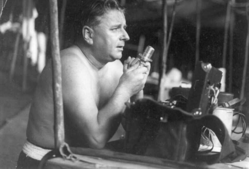 Tom Harrisson broadcasting on old BBC radio in special forces